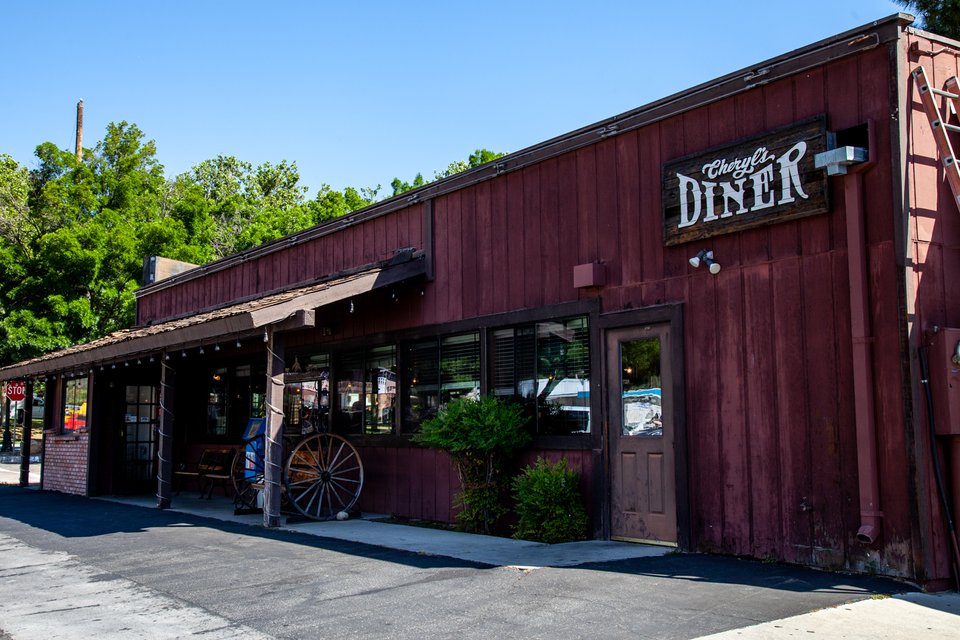 Diner tables with outdoor seating.
